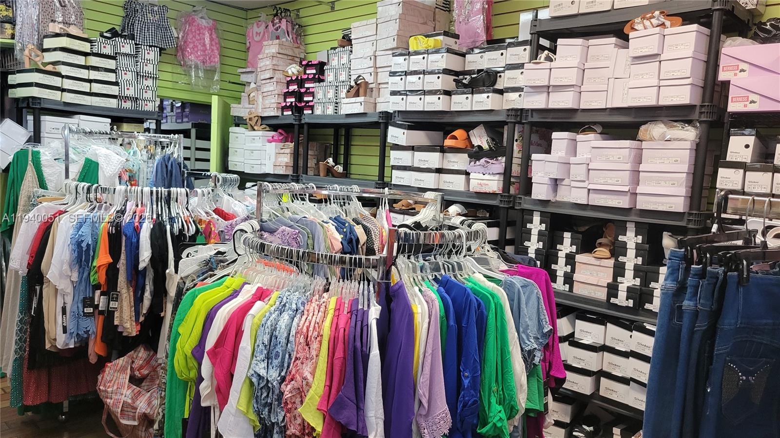 4036 West 12th Avenue Hialeah, FL 33012 - Photo 9 of 16 a view of walk in closet with clothes