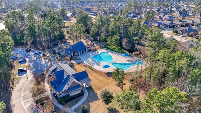 an aerial view of residential house with outdoor space