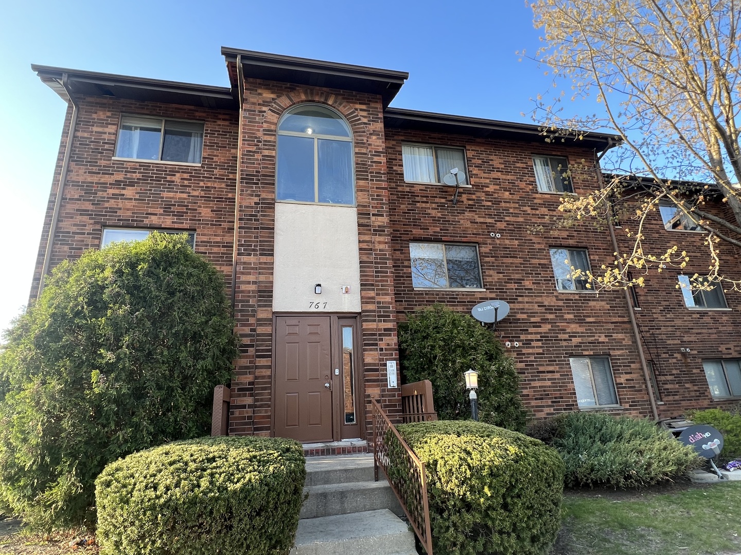 767 Inland Circle Naperville, IL 60563 - Photo 1 of 1 a brick house with a large windows