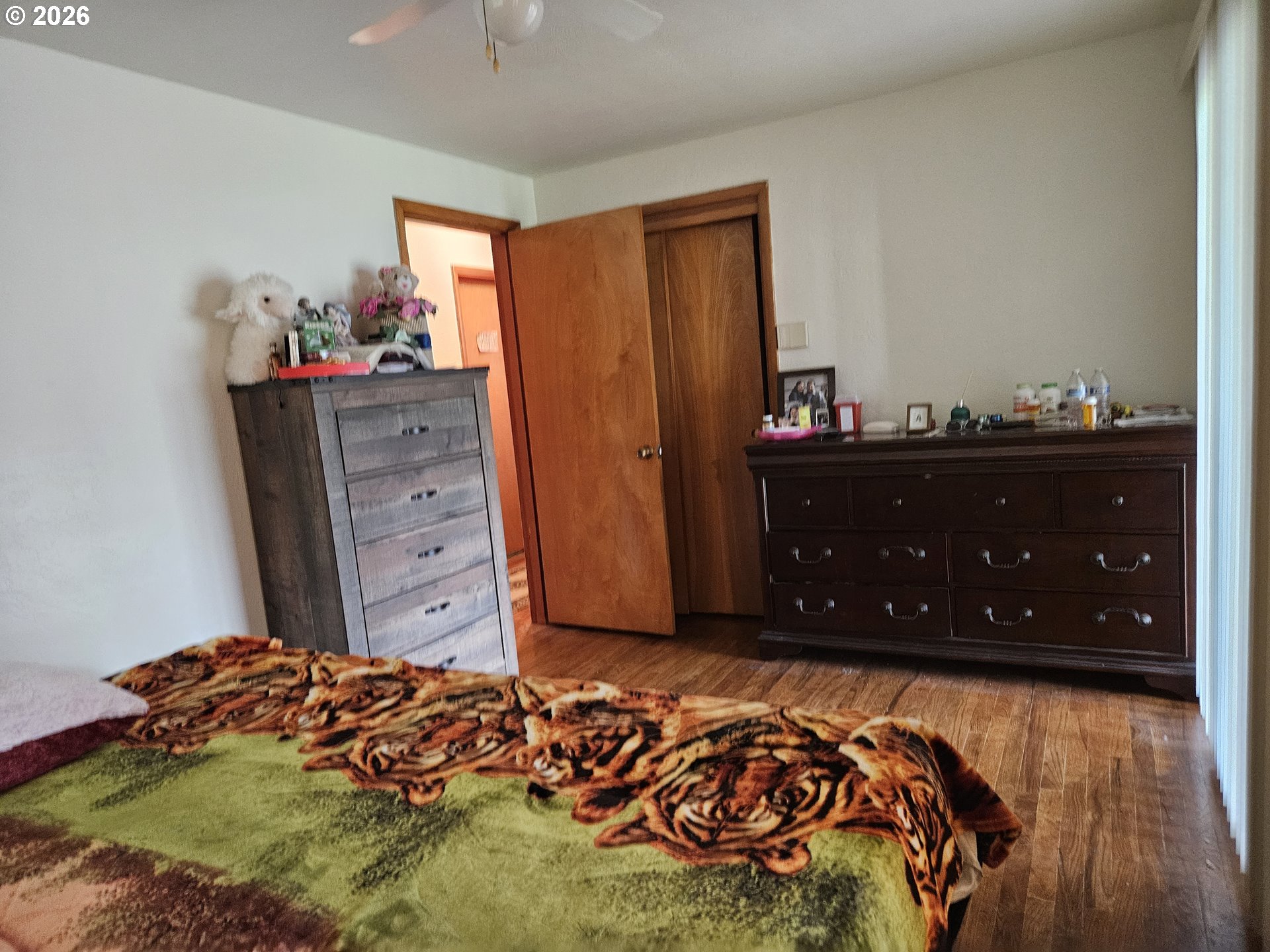 4747 Homer Road Northeast Salem, OR 97305 - Photo 14 of 21 a bed room with a bed and a dresser