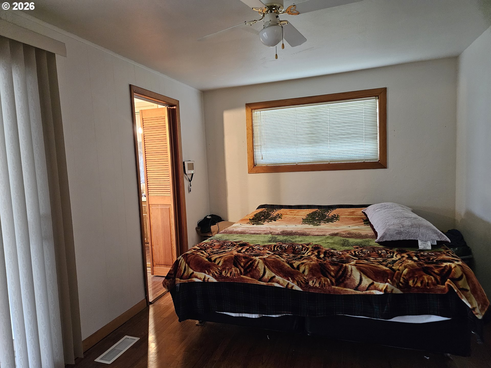 4747 Homer Road Northeast Salem, OR 97305 - Photo 15 of 21 a bedroom with a bed and window