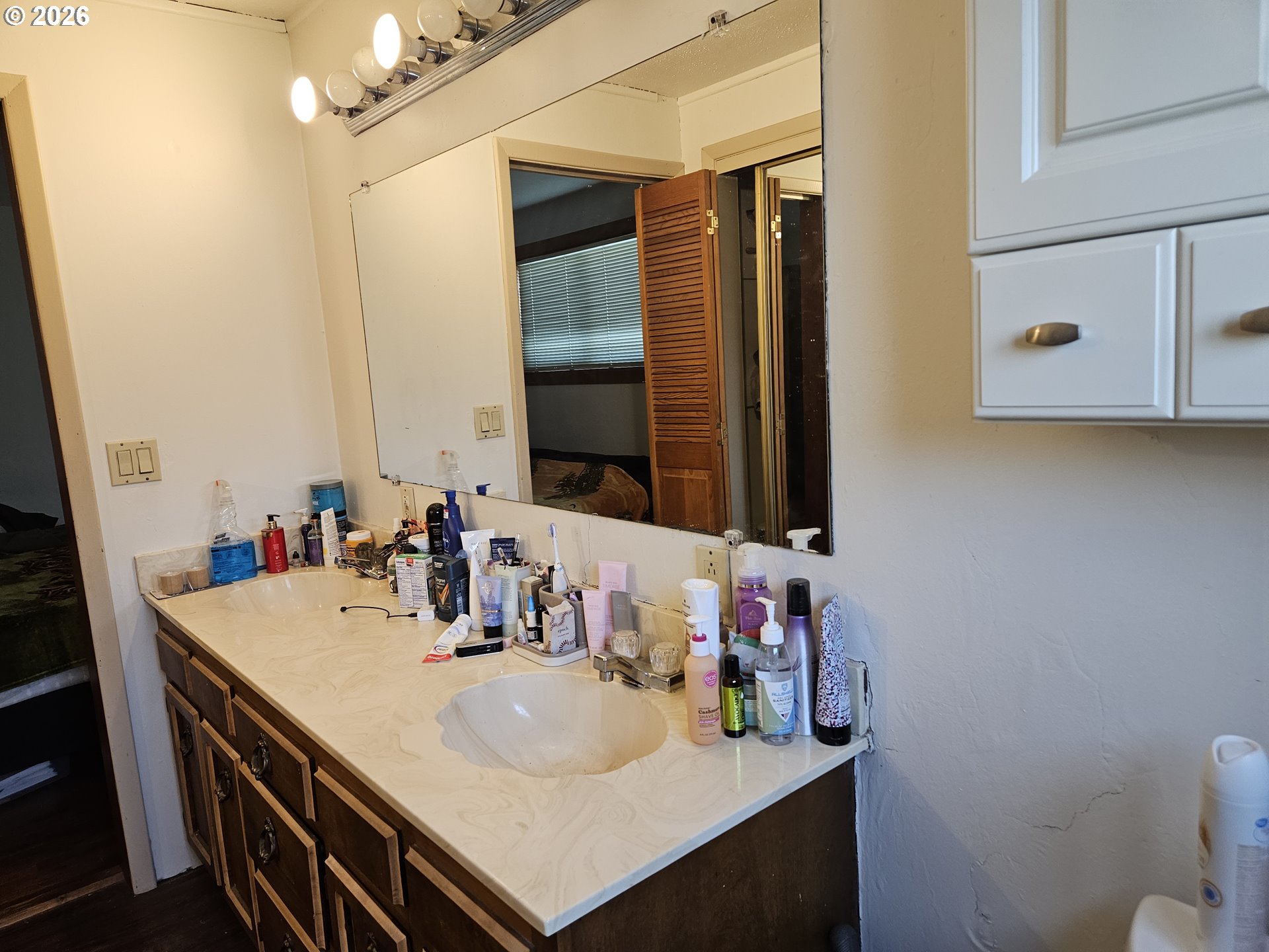 4747 Homer Road Northeast Salem, OR 97305 - Photo 17 of 21 a bathroom with a sink vanity and a mirror