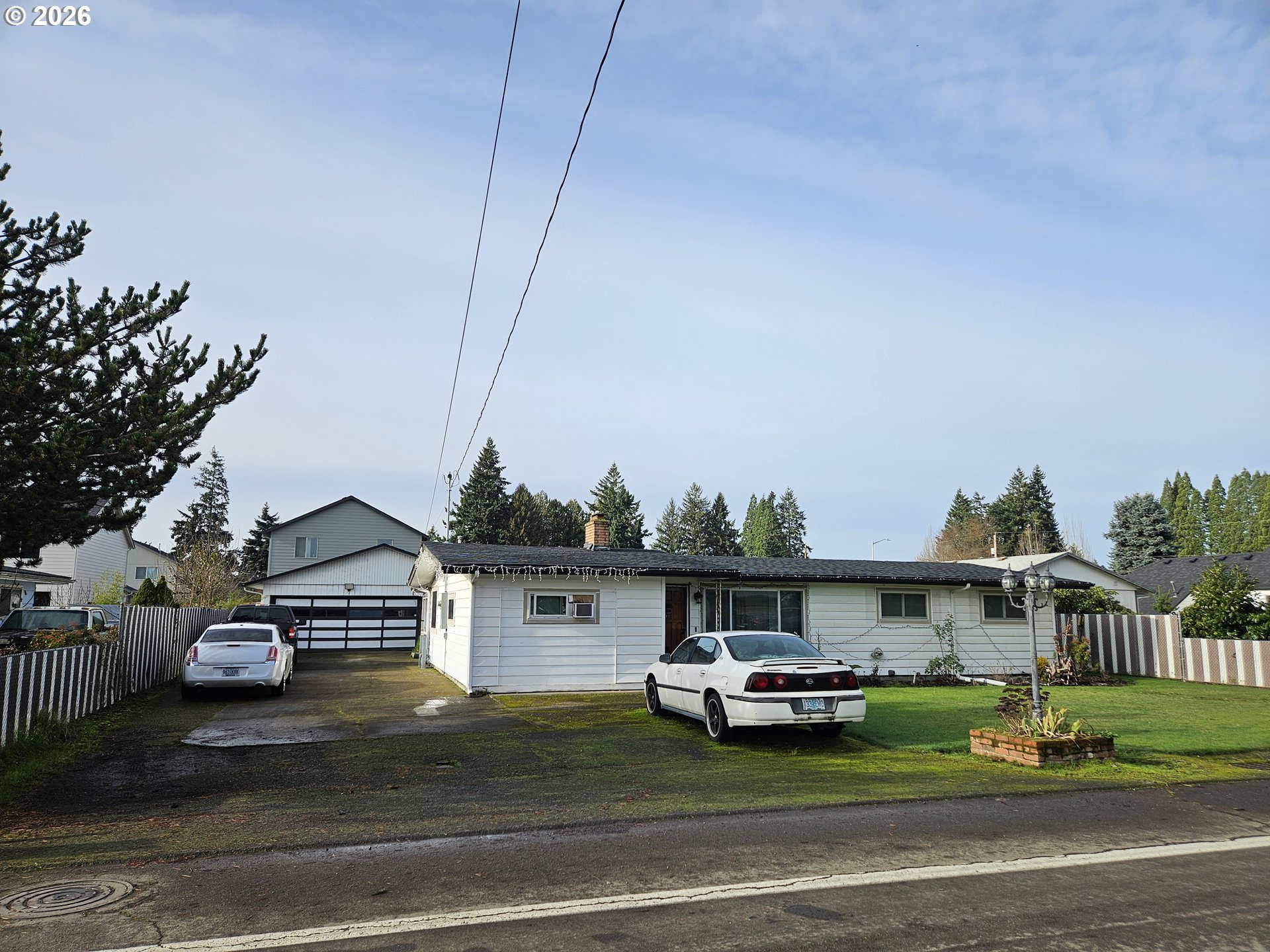 4747 Homer Road Northeast Salem, OR 97305 - Photo 2 of 21 a view of street with parked cars