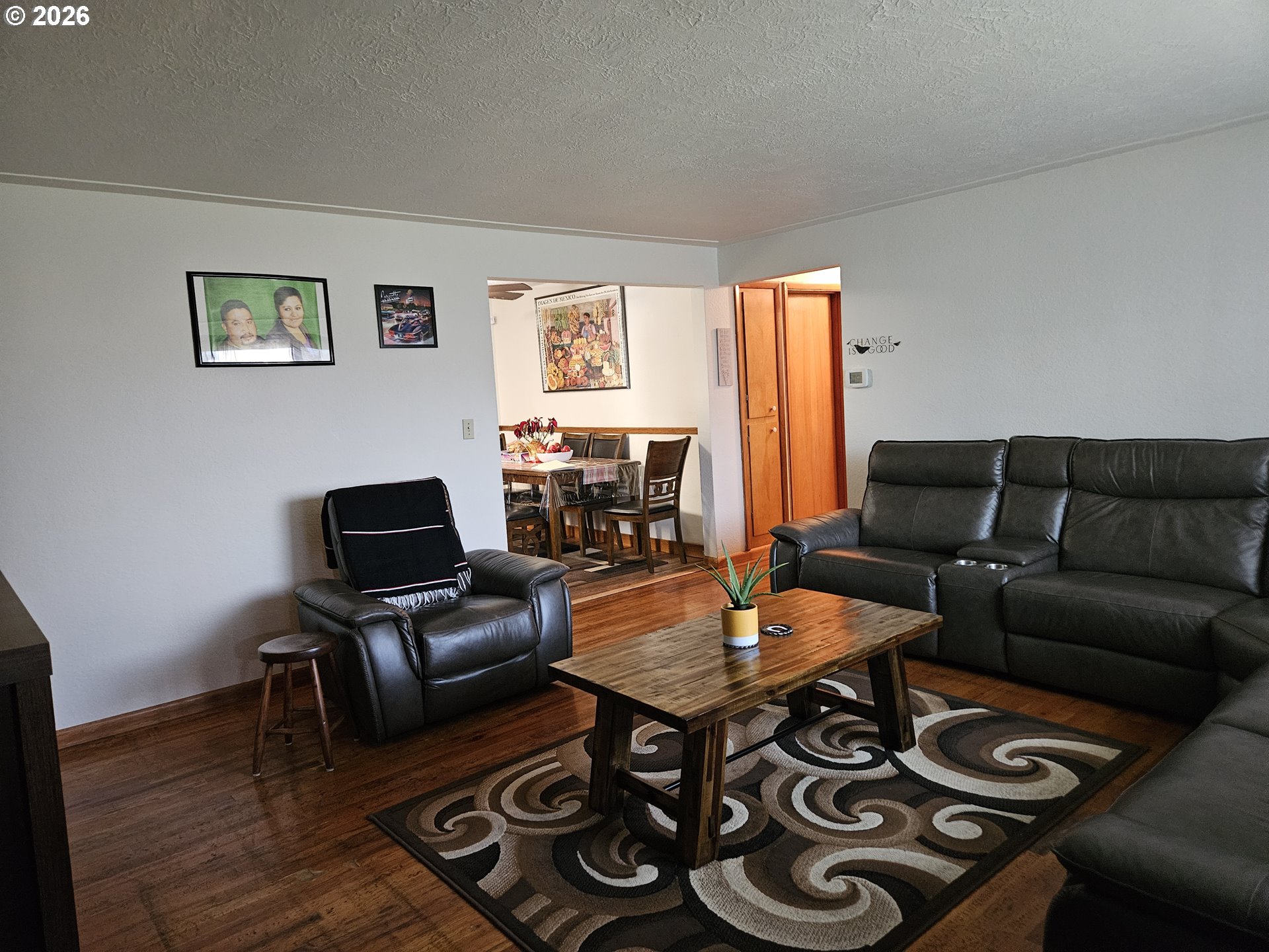 4747 Homer Road Northeast Salem, OR 97305 - Photo 4 of 21 a living room with furniture and a wooden floor