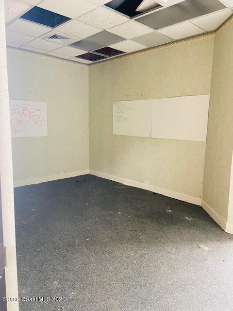 1890 Palm Bay Road Northeast Palm Bay, FL 32905 - Photo 5 of 7 a view of an empty room