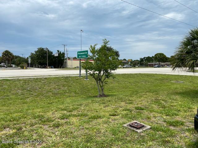 1890 Palm Bay Road Northeast Palm Bay, FL 32905 - Photo 7 of 7 a view of a lake with a yard