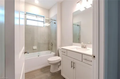a view of a bedroom from the hallway