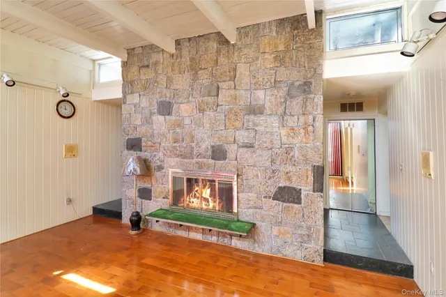 a living room with a fireplace
