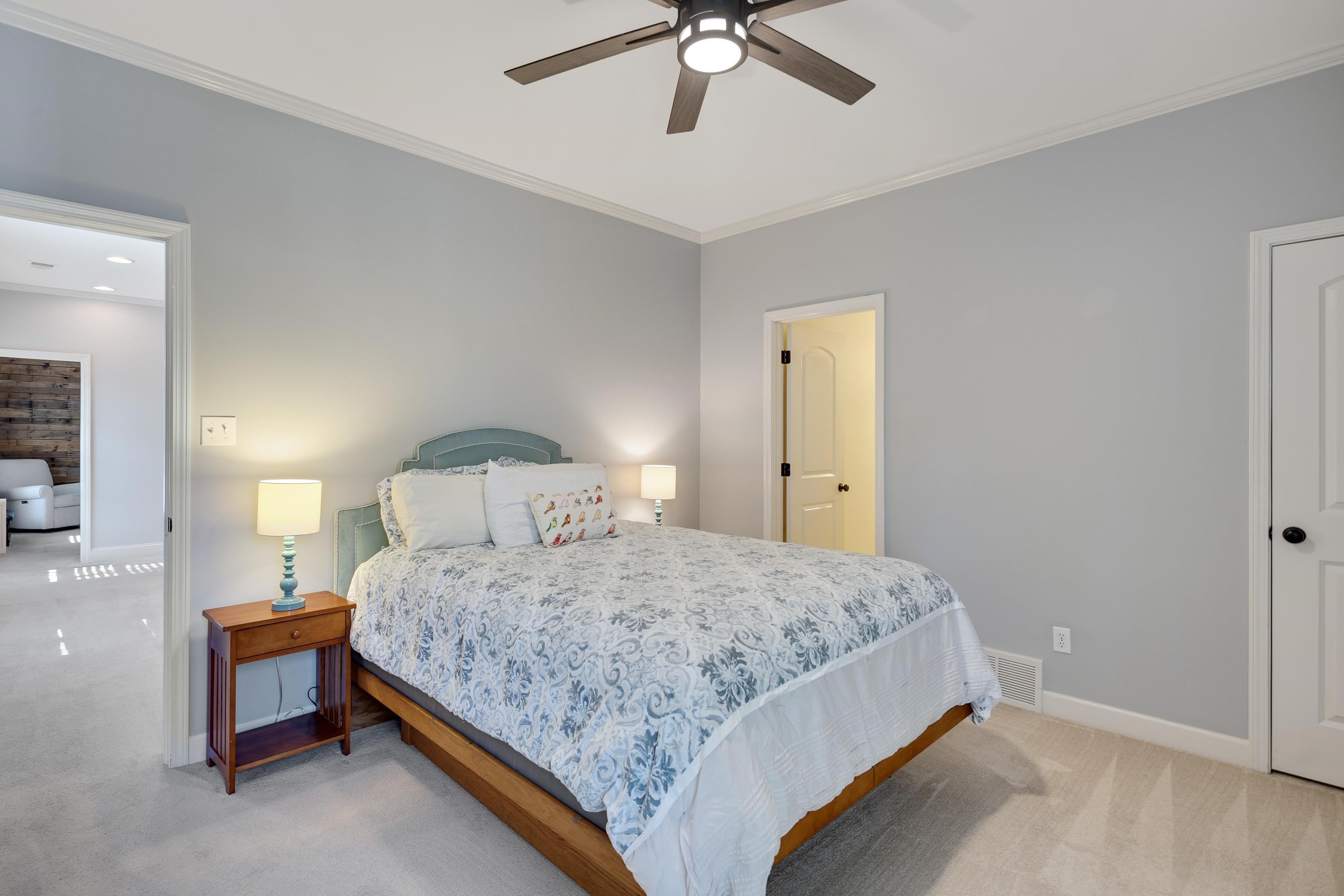 237 Windover Road Memphis, TN 38111 - Photo 29 of 37 Bedroom with crown molding, a ceiling fan, and light colored carpet
