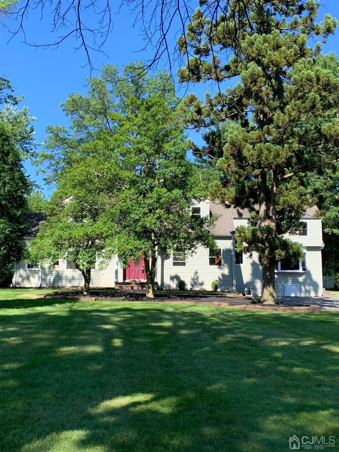 381 Plainfield Road Edison, NJ 08820 - Photo 1 of 23 a garden view with a sitting space