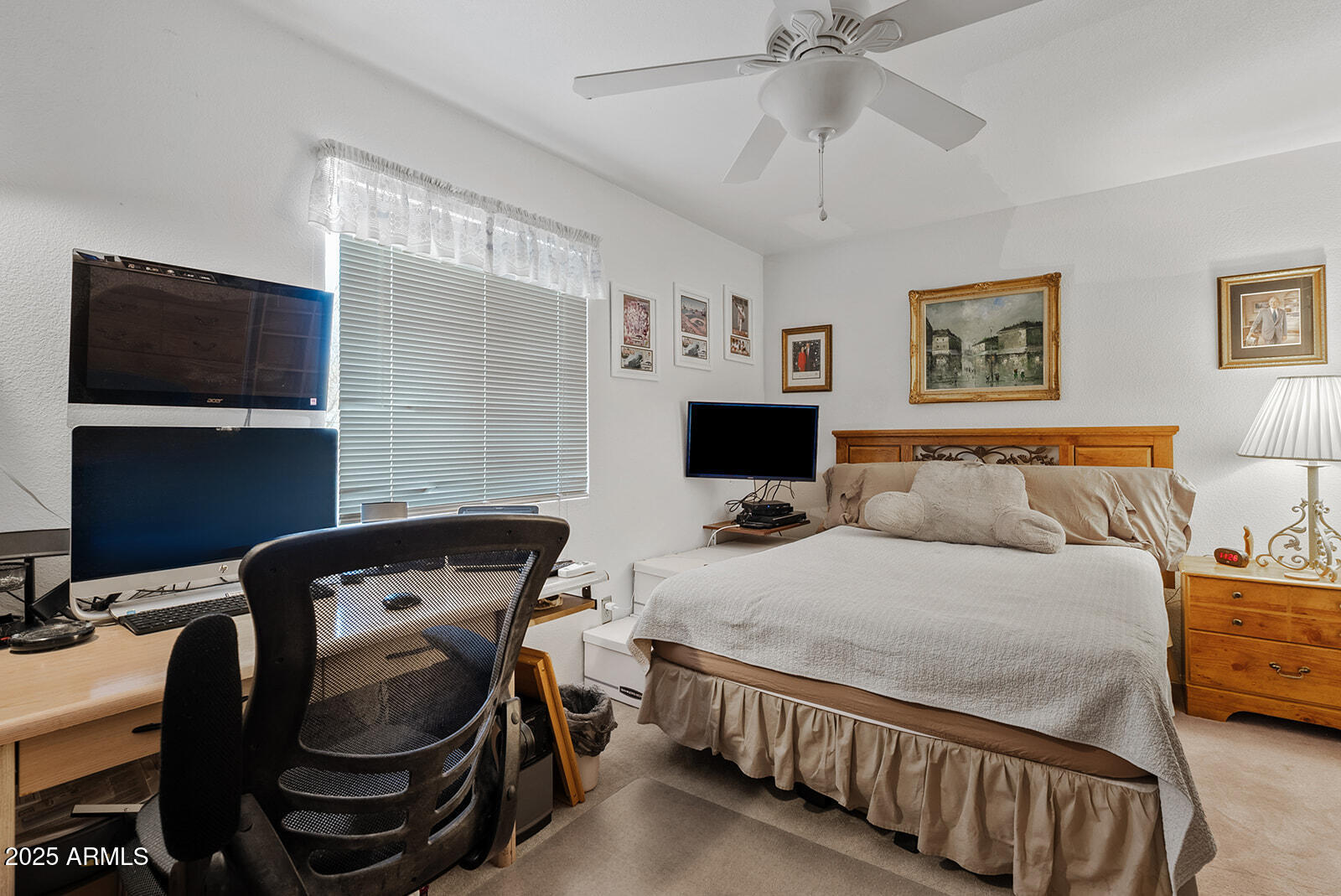 75 North Val Vista Road Apache Junction, AZ 85119 - Photo 23 of 39 a bedroom with a bed and a flat screen tv
