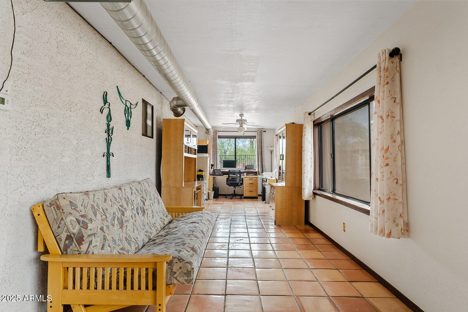 75 North Val Vista Road Apache Junction, AZ 85119 - Photo 25 of 39 a living room with furniture and a large window