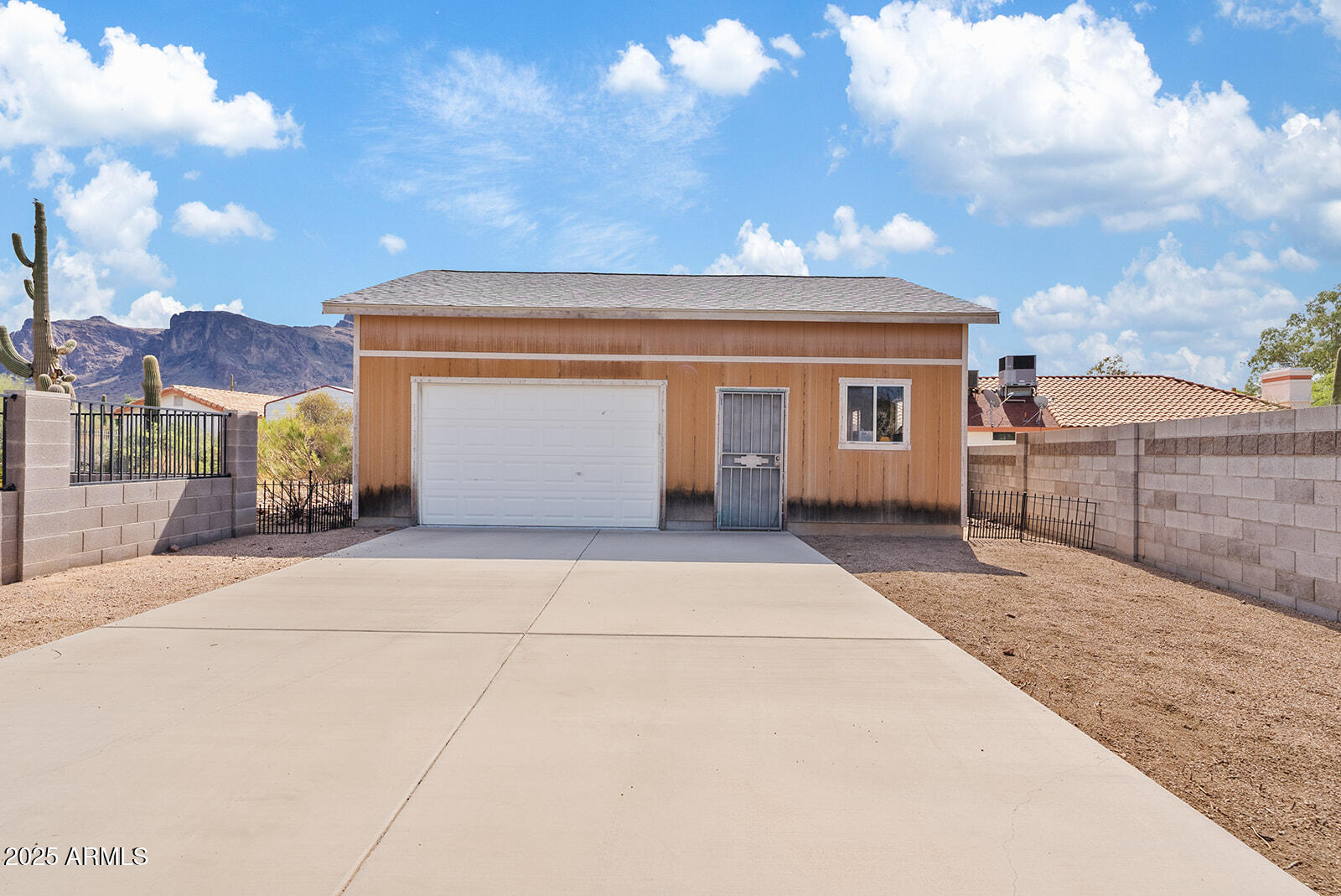 75 North Val Vista Road Apache Junction, AZ 85119 - Photo 29 of 39 a view of a house with a patio