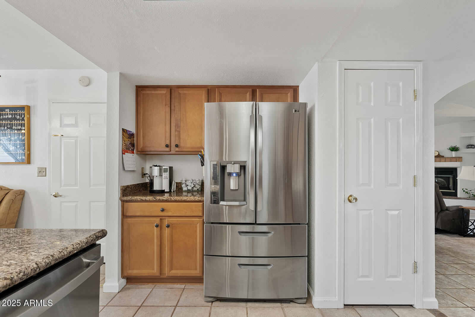 75 North Val Vista Road Apache Junction, AZ 85119 - Photo 9 of 39 a kitchen with stainless steel appliances granite countertop a refrigerator sink and cabinets