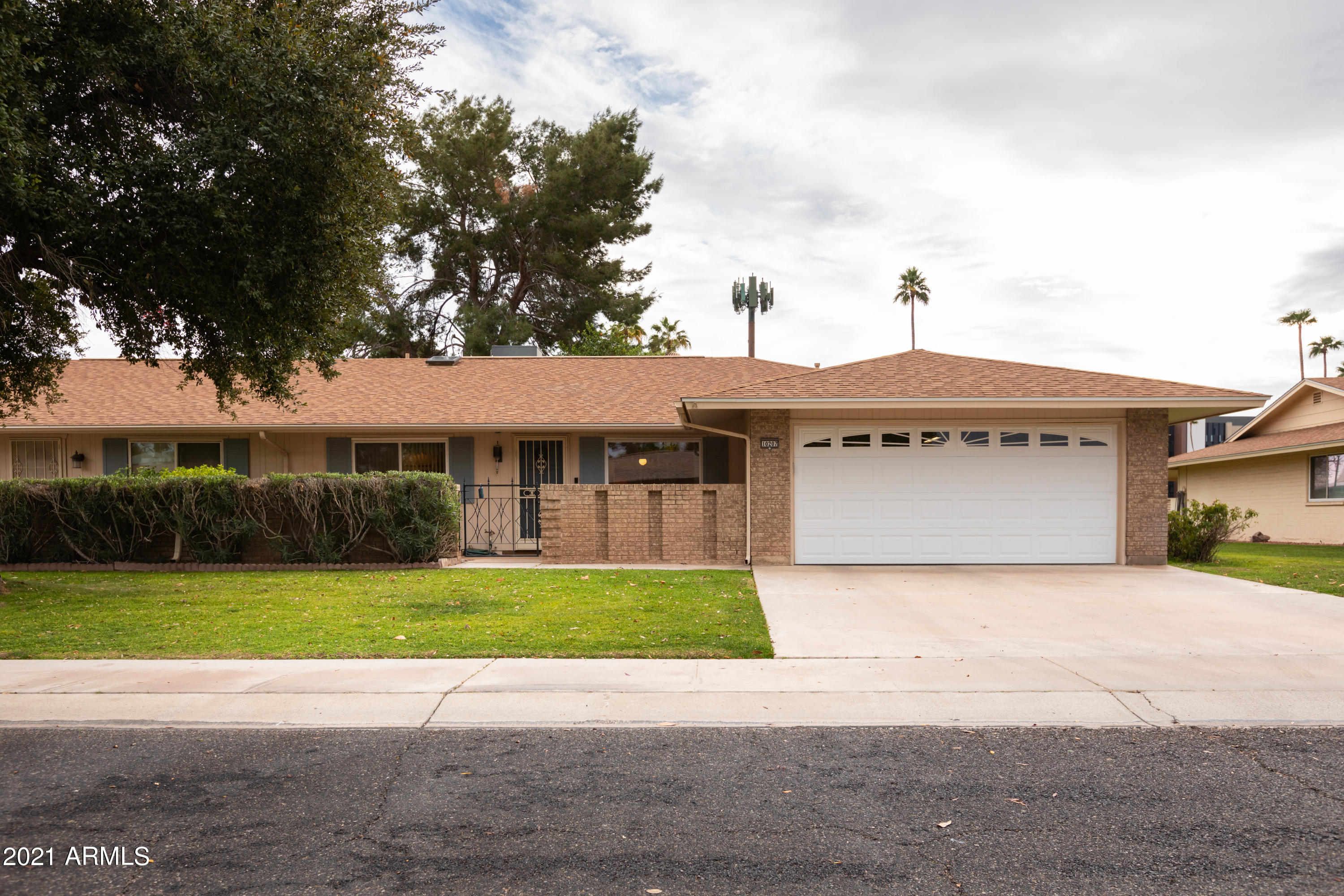 10207 West Royal Oak Road Sun City, AZ 85351 - Photo 1 of 38 front 1