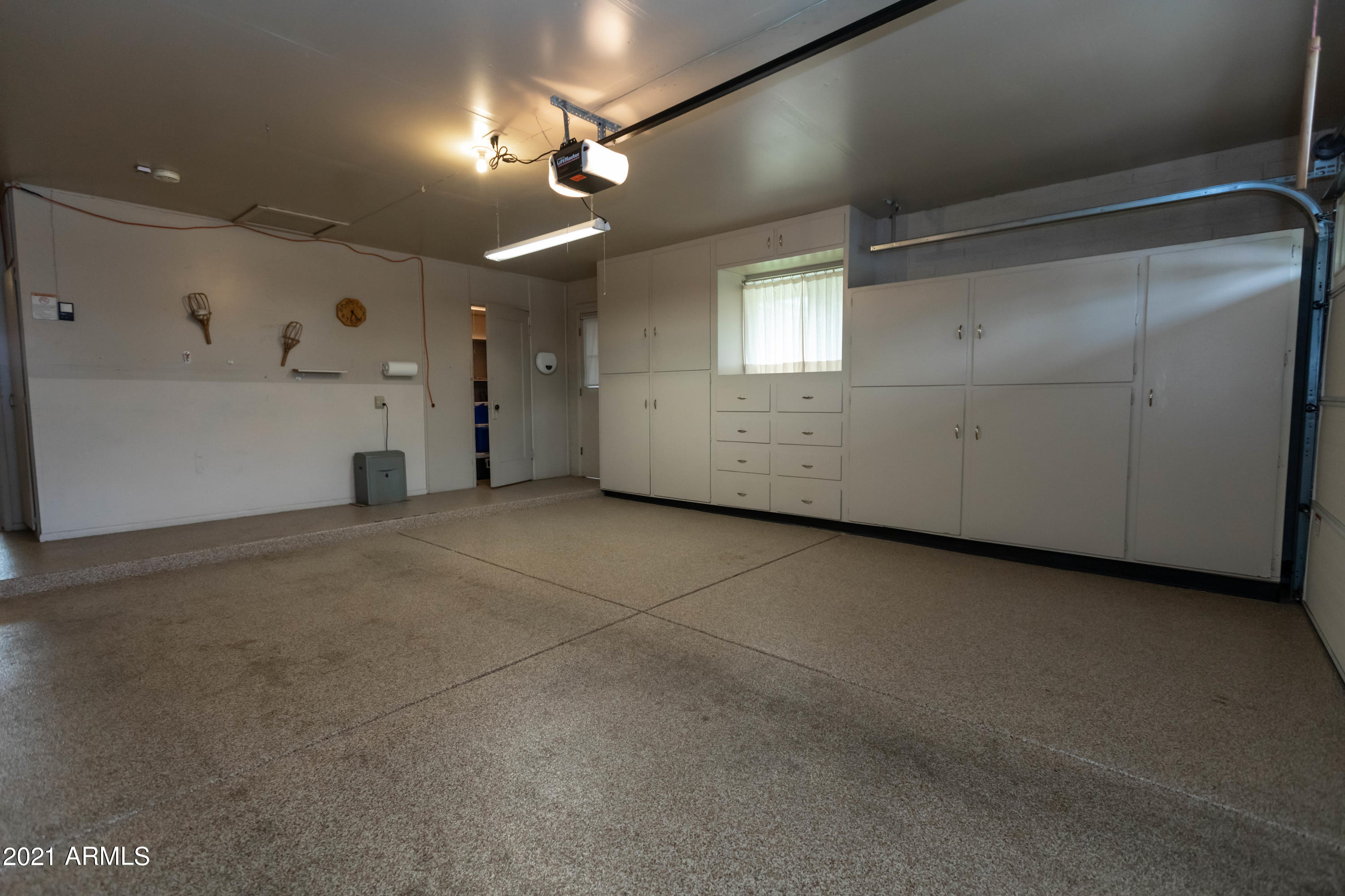 10207 West Royal Oak Road Sun City, AZ 85351 - Photo 38 of 38 garage storage