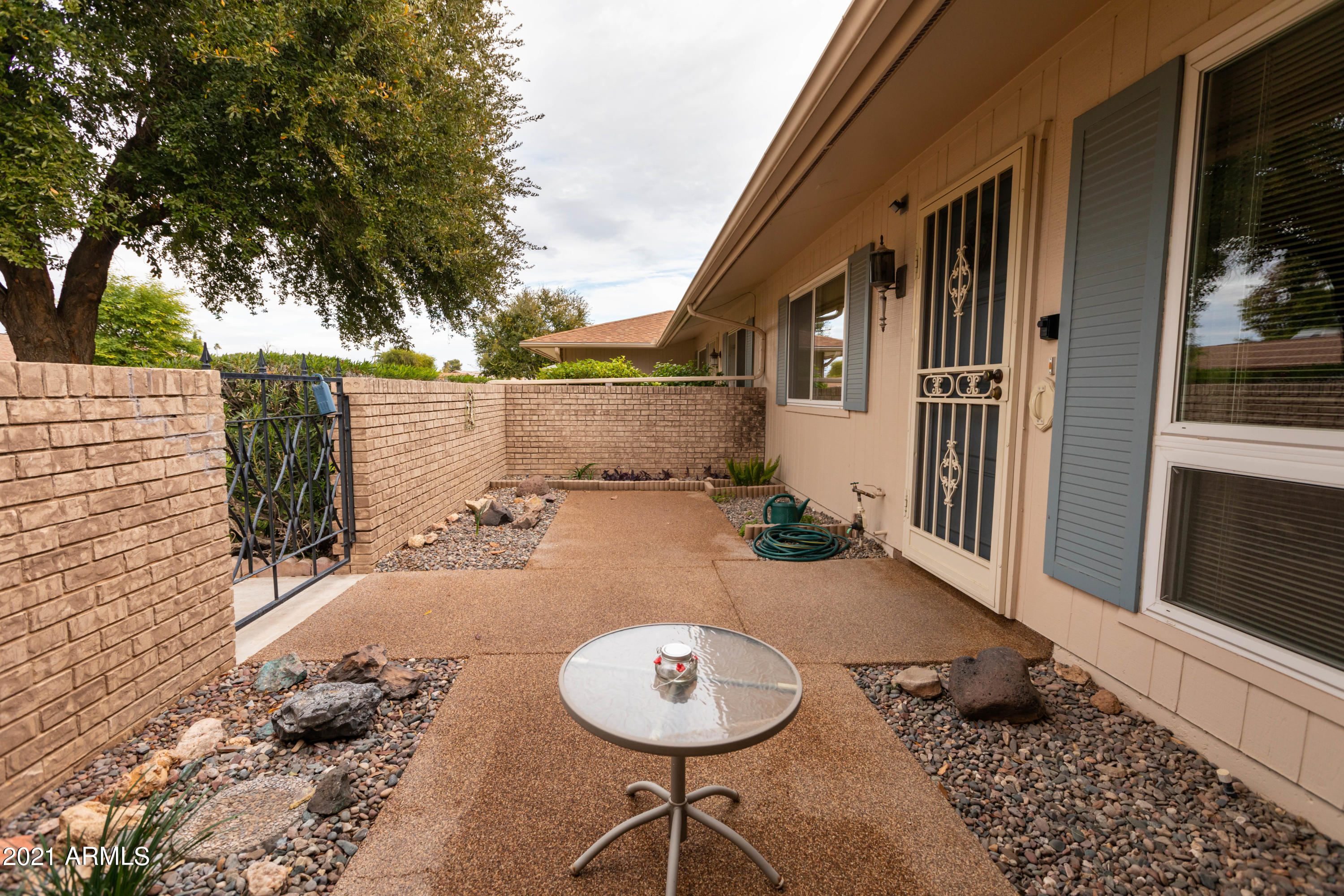 10207 West Royal Oak Road Sun City, AZ 85351 - Photo 6 of 38 front courtyard 3