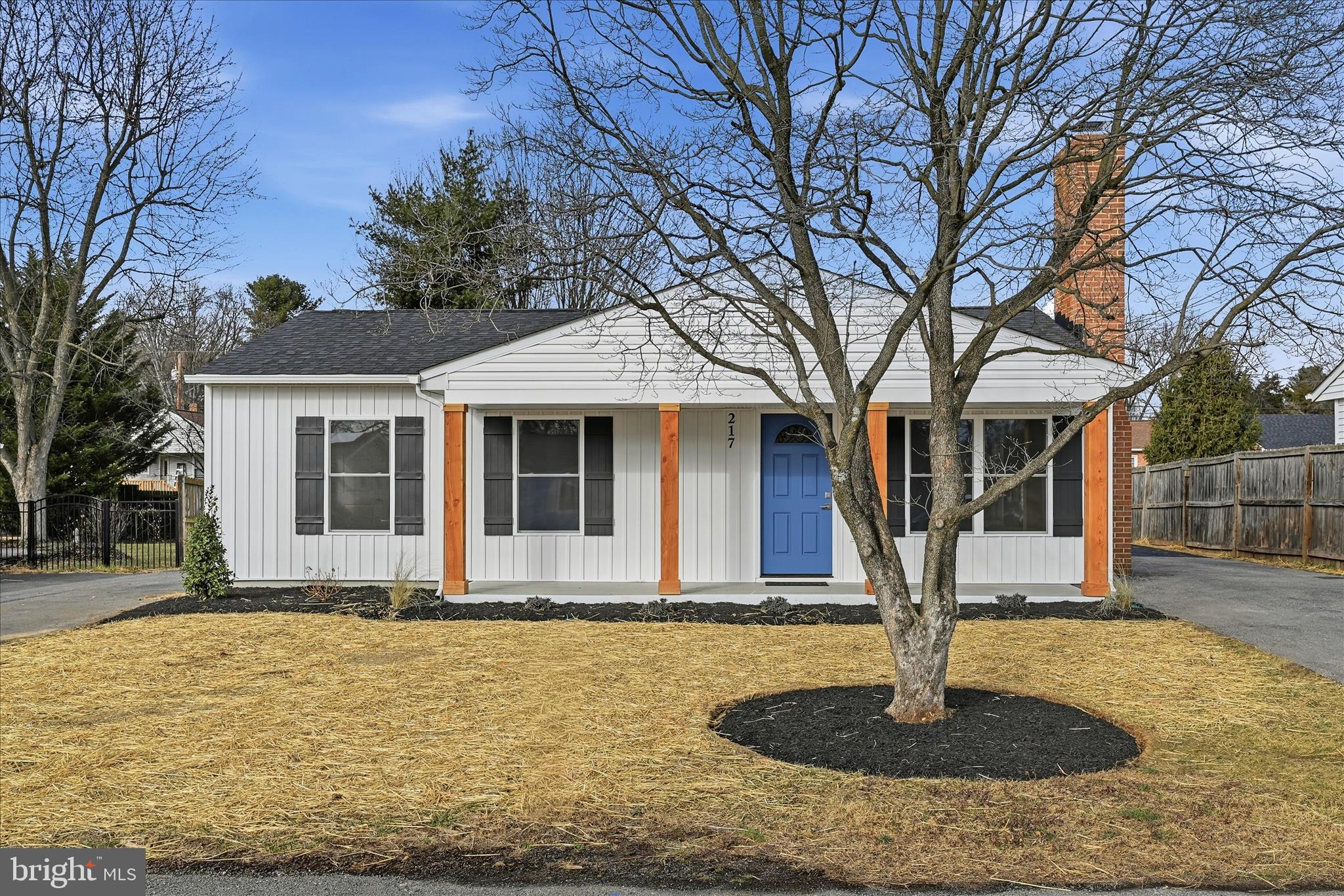 a front view of house with small garden
