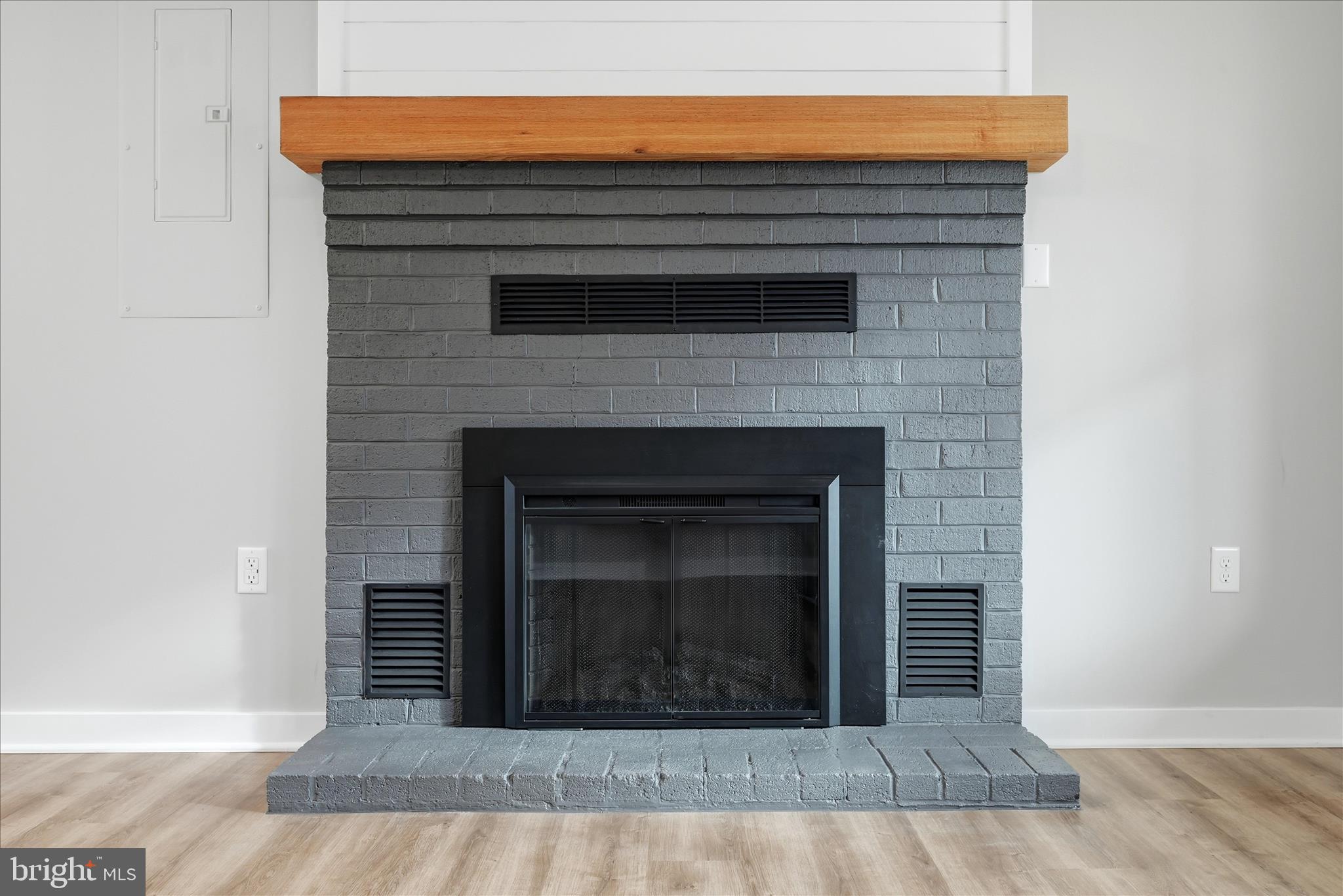217 Myrtle Avenue Winchester, VA 22601 - Photo 13 of 52 a living room with a fireplace in a room