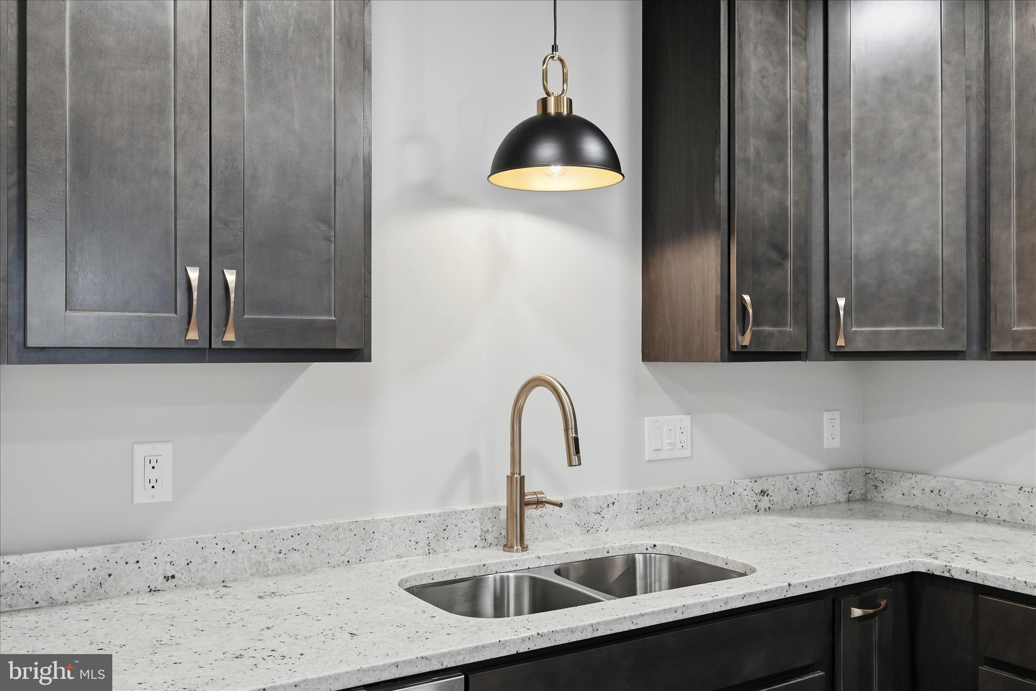 217 Myrtle Avenue Winchester, VA 22601 - Photo 21 of 52 a kitchen with a sink and cabinets