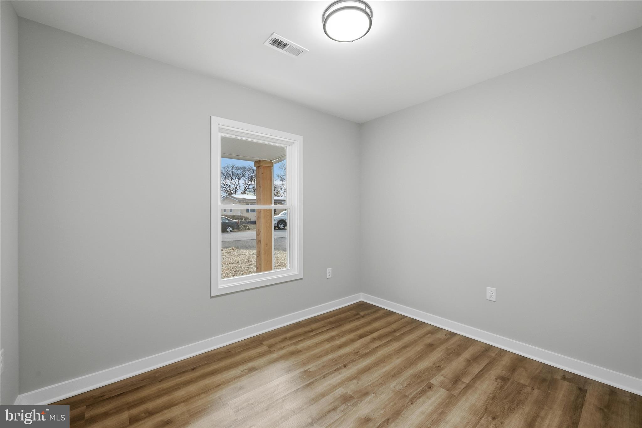 217 Myrtle Avenue Winchester, VA 22601 - Photo 24 of 52 an empty room with a window