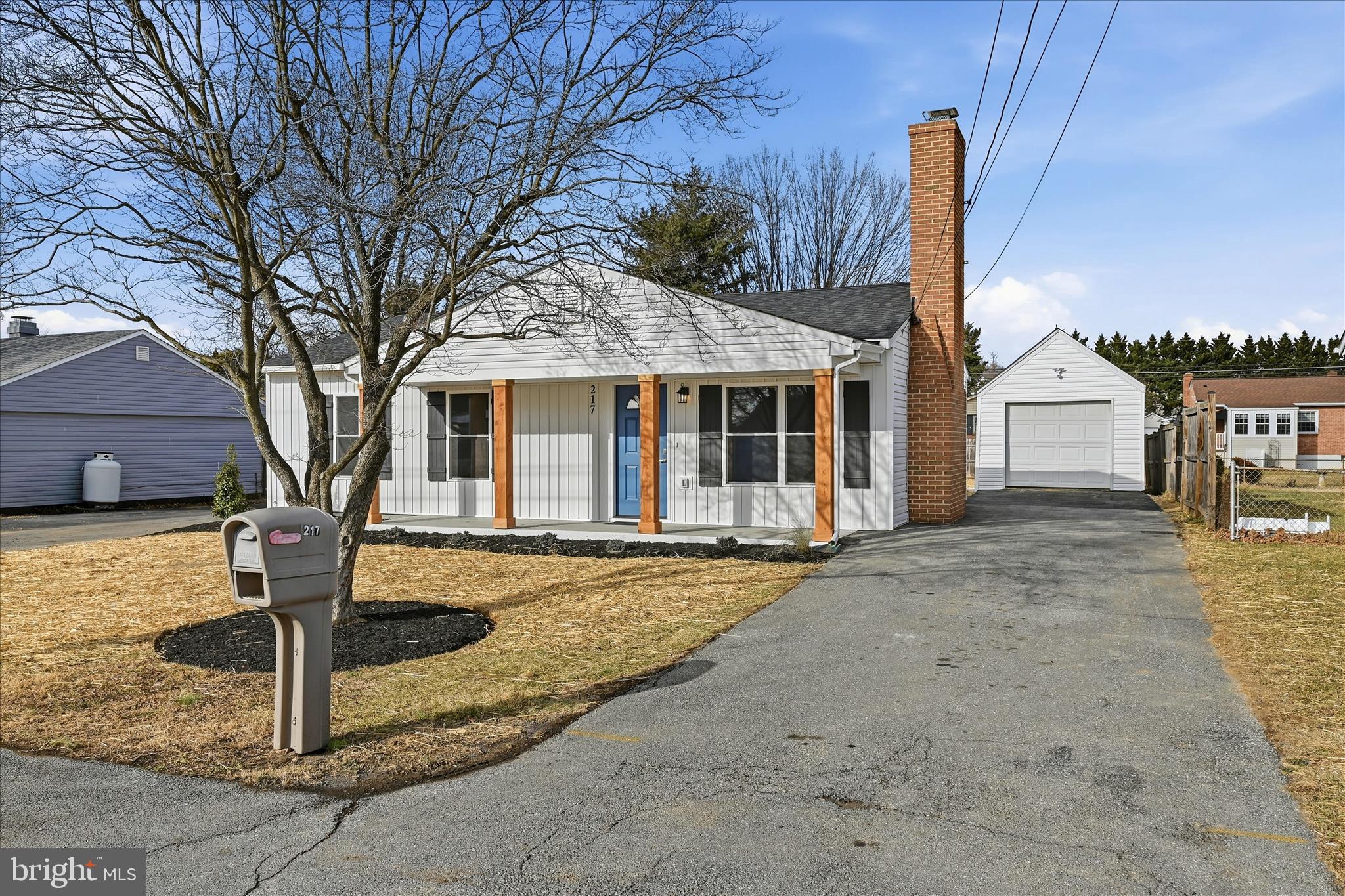 217 Myrtle Avenue Winchester, VA 22601 - Photo 3 of 52 a front view of a house with garden