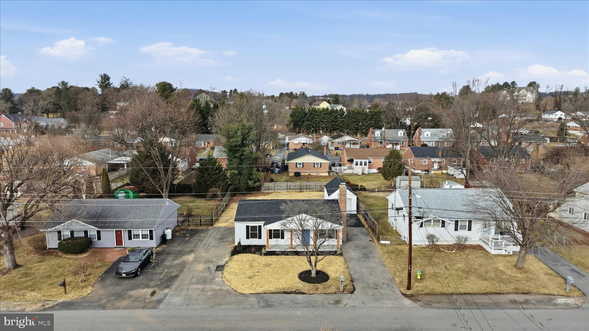 217 Myrtle Avenue Winchester, VA 22601 - Photo 38 of 52 an aerial view of a house with swimming pool and mountains