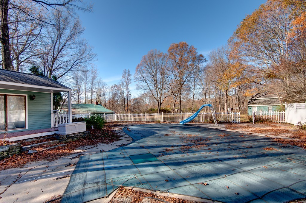 21 Corbin Road Dudley, MA 01571 - Photo 7 of 30 a view of a house with backyard and trees