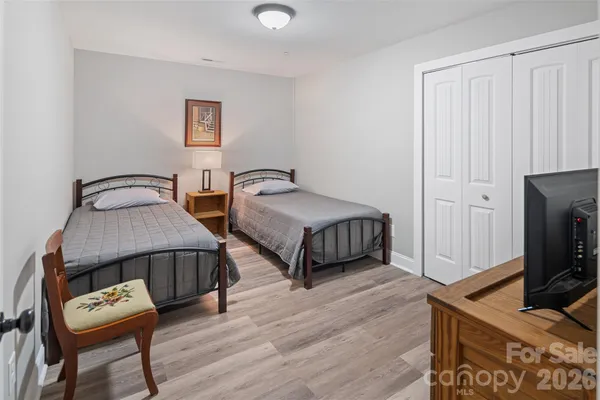 a room with wooden floor and utility
