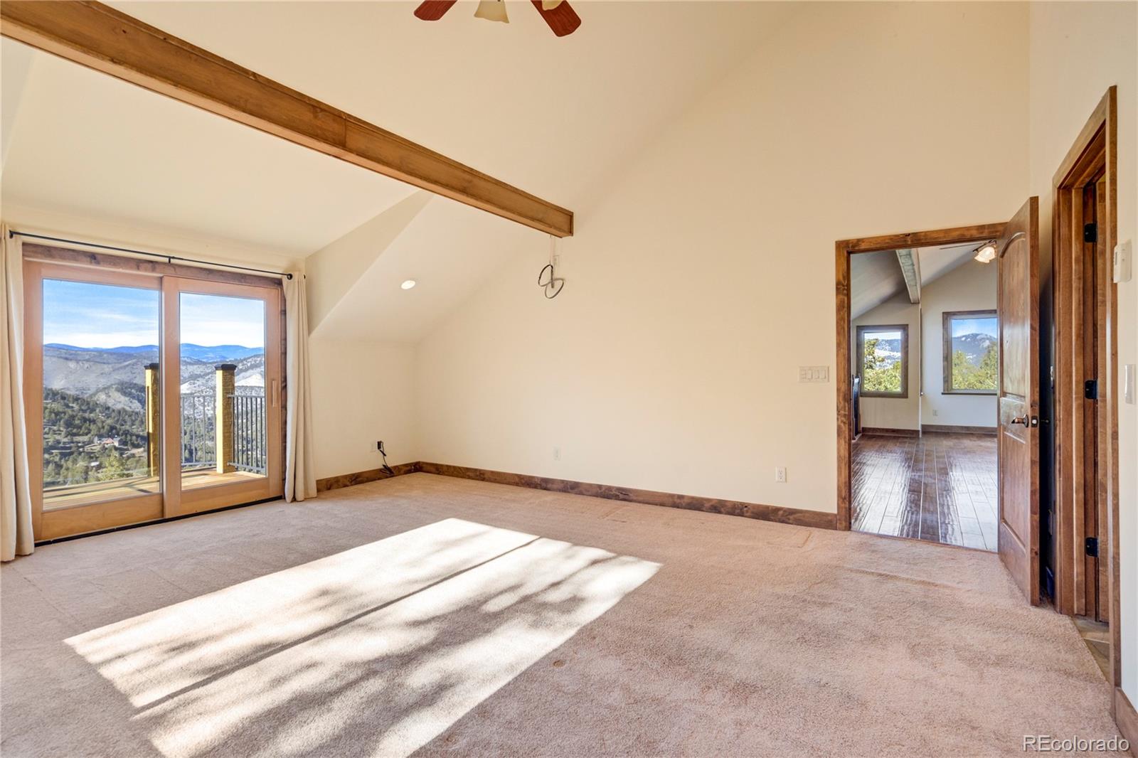 85 Santa Fe Mountain Road Evergreen, CO 80439 - Photo 7 of 47 a view of an empty room and window