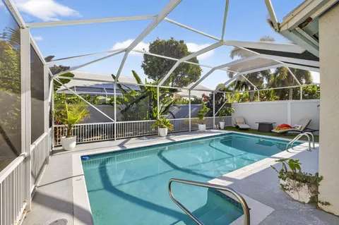 a view of a balcony with wooden floor