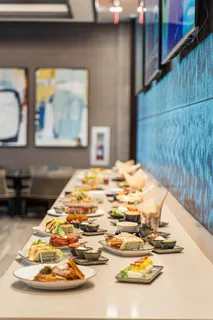 a view of a swimming pool with an outdoor seating