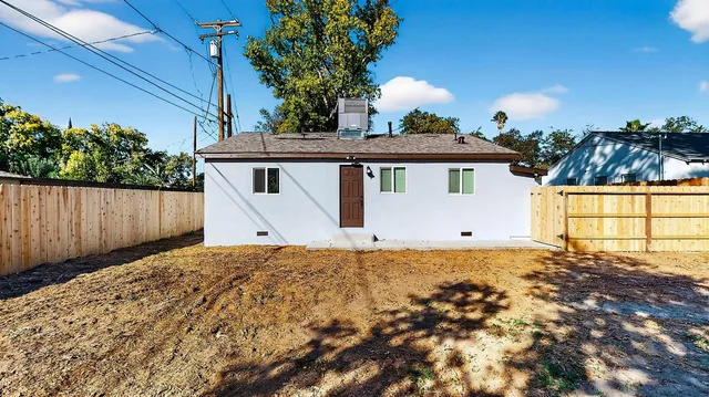 a view of a house with a garden