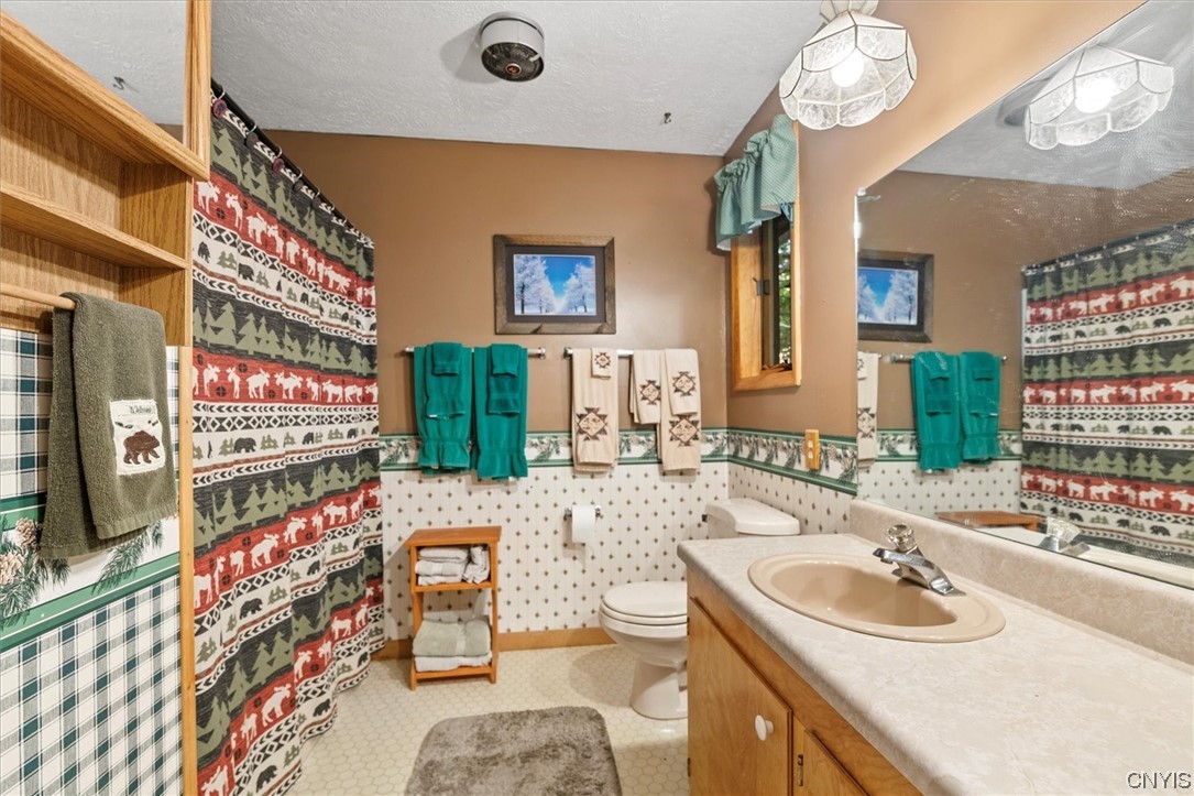 105 Riverside Drive Webb, NY 13420 - Photo 15 of 22 Generous sized full bathroom