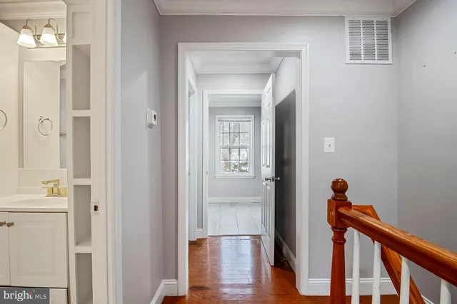 a view of a hallway and interior of the house