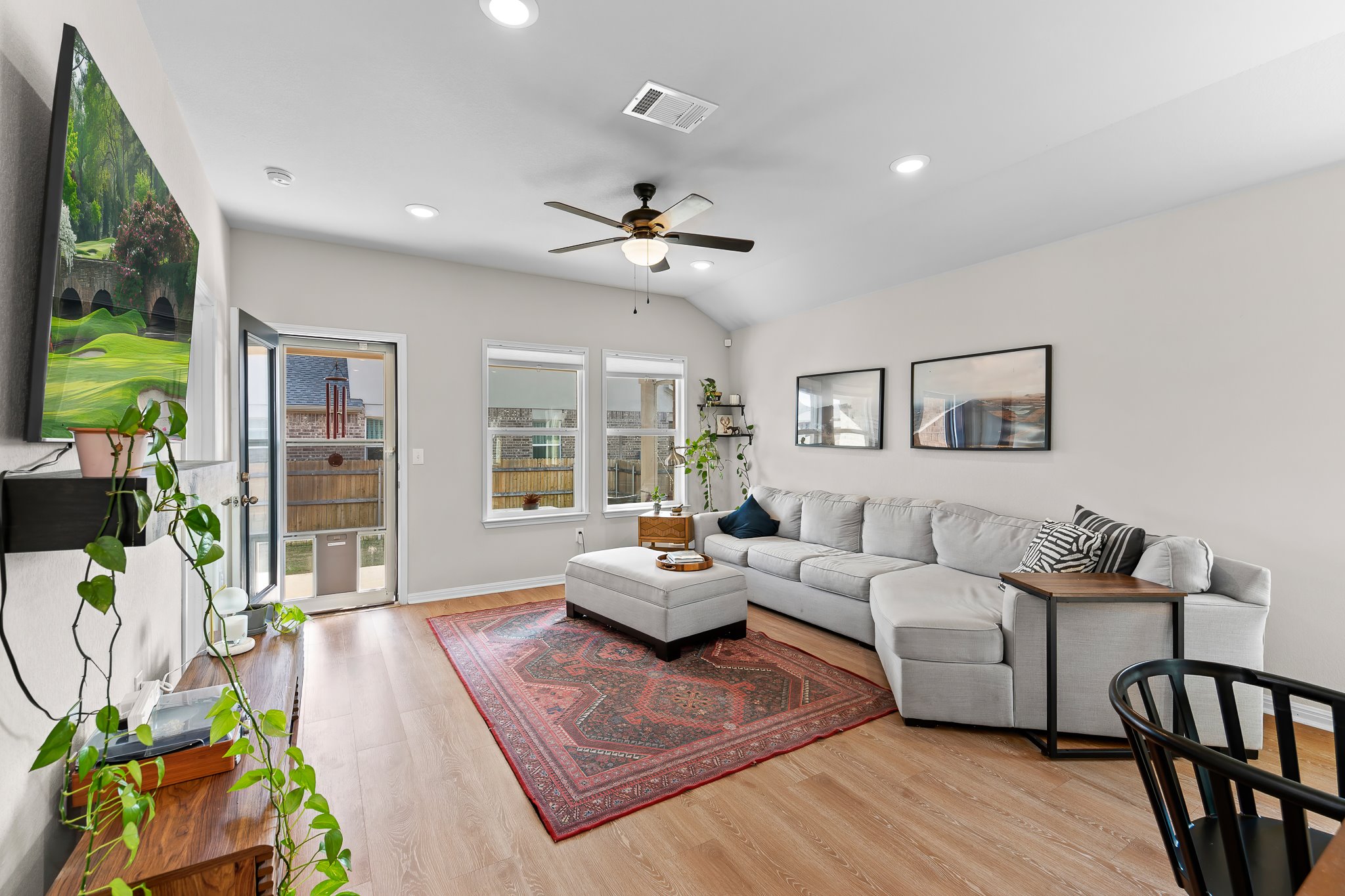 213 Mais Drive Georgetown, TX 78626 - Photo 17 of 39 a living room with furniture or couch and a chandelier
