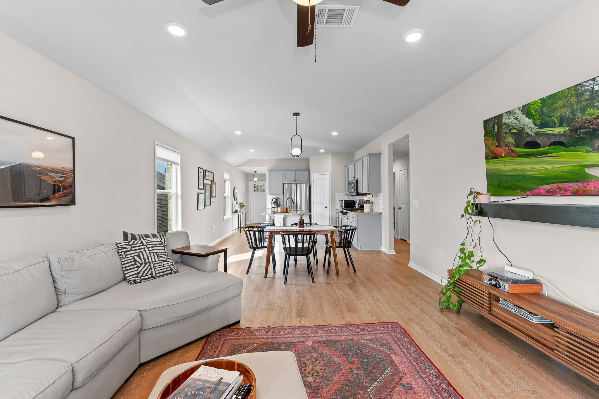 213 Mais Drive Georgetown, TX 78626 - Photo 20 of 39 a living room with furniture and a wooden floor