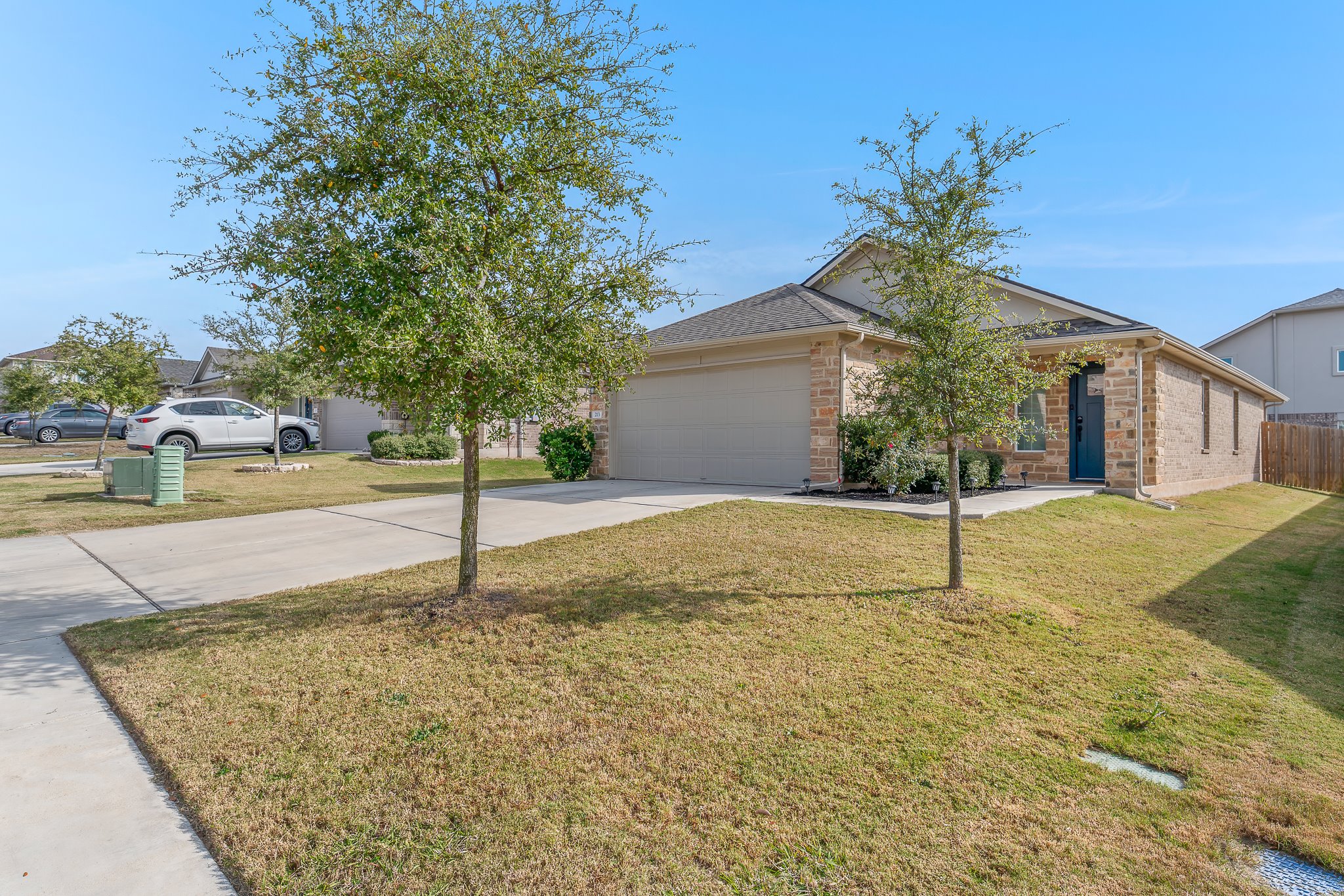 213 Mais Drive Georgetown, TX 78626 - Photo 2 of 39 a house with palm tree in front of it