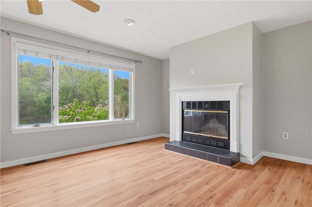 50 Abbott Run Valley Road, Unit 1604 Cumberland, RI 02864 - Photo 10 of 30 Livingroom w/fireplace