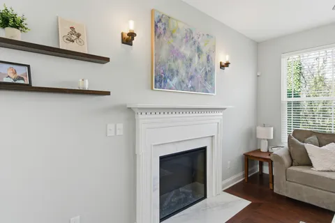 a kitchen with stainless steel appliances granite countertop a sink a stove and cabinets