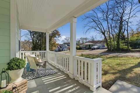 a view of outdoor sitting area with furniture