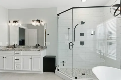 a backyard of a house with barbeque oven table and chairs