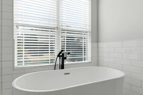 a view of a chairs and table on the deck