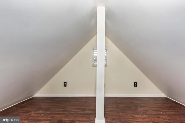 a view of a big room with wooden floor
