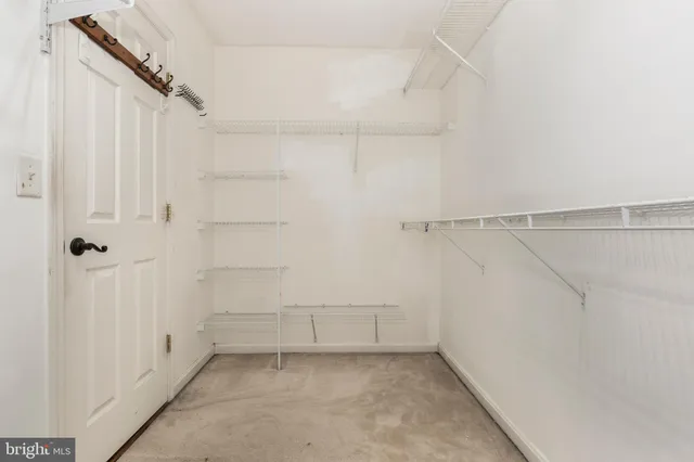 a view of a room with racks on the wall