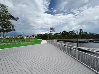 a view of a park with large trees