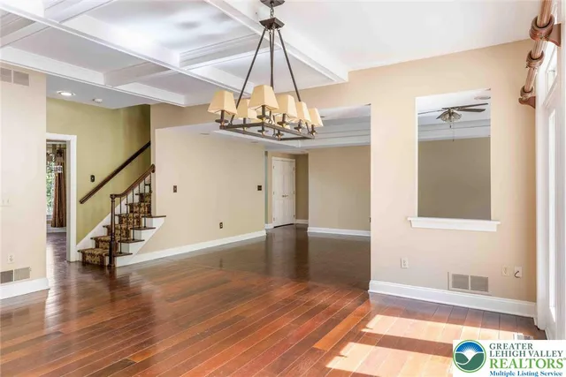 a kitchen with a stove a sink and a refrigerator