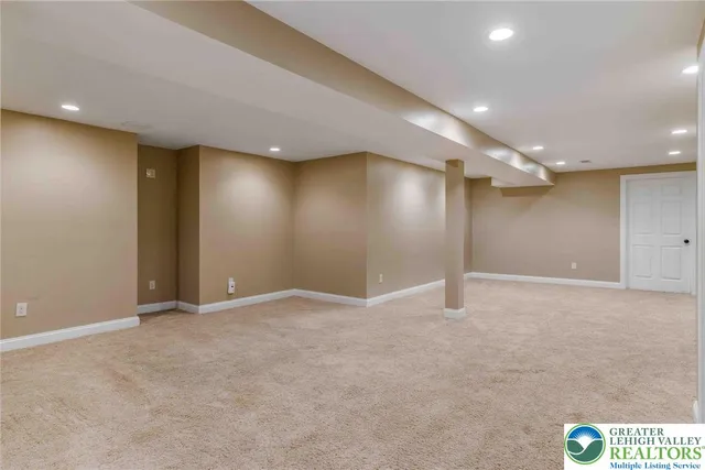 a bathroom with a shower and a sink