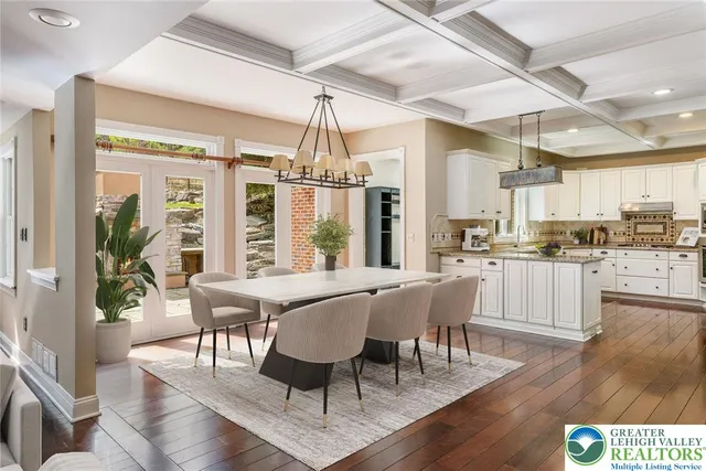 a view of empty room with wooden floor and fireplace