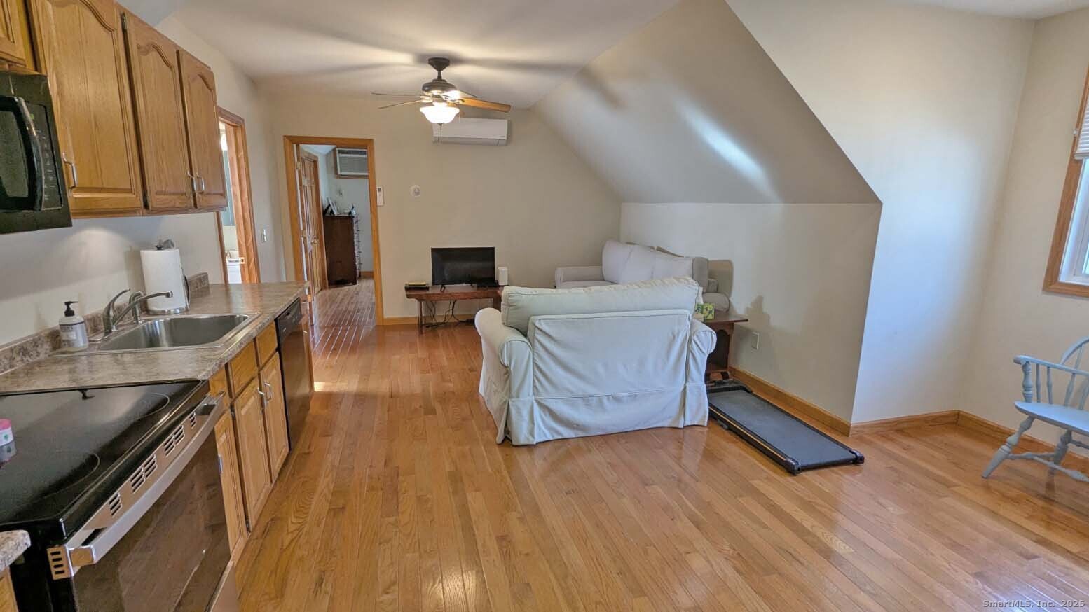 34 Hog Hill Road East Hampton, CT 06424 - Photo 3 of 11 a living room with furniture and a wooden floor